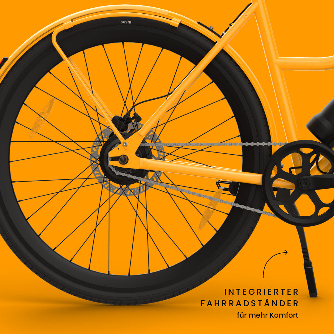 California Roll 3.0+ Lava: Fokus auf integrierten Fahrradständer, Kette und Hinterrad