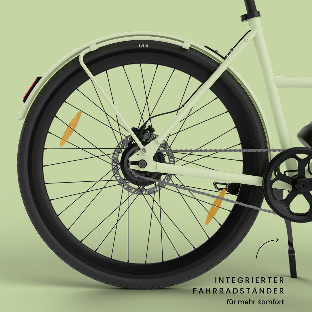 California Roll 3.0+ Matcha: Fokus auf integrierten Fahrradständer, Kette und Hinterrad